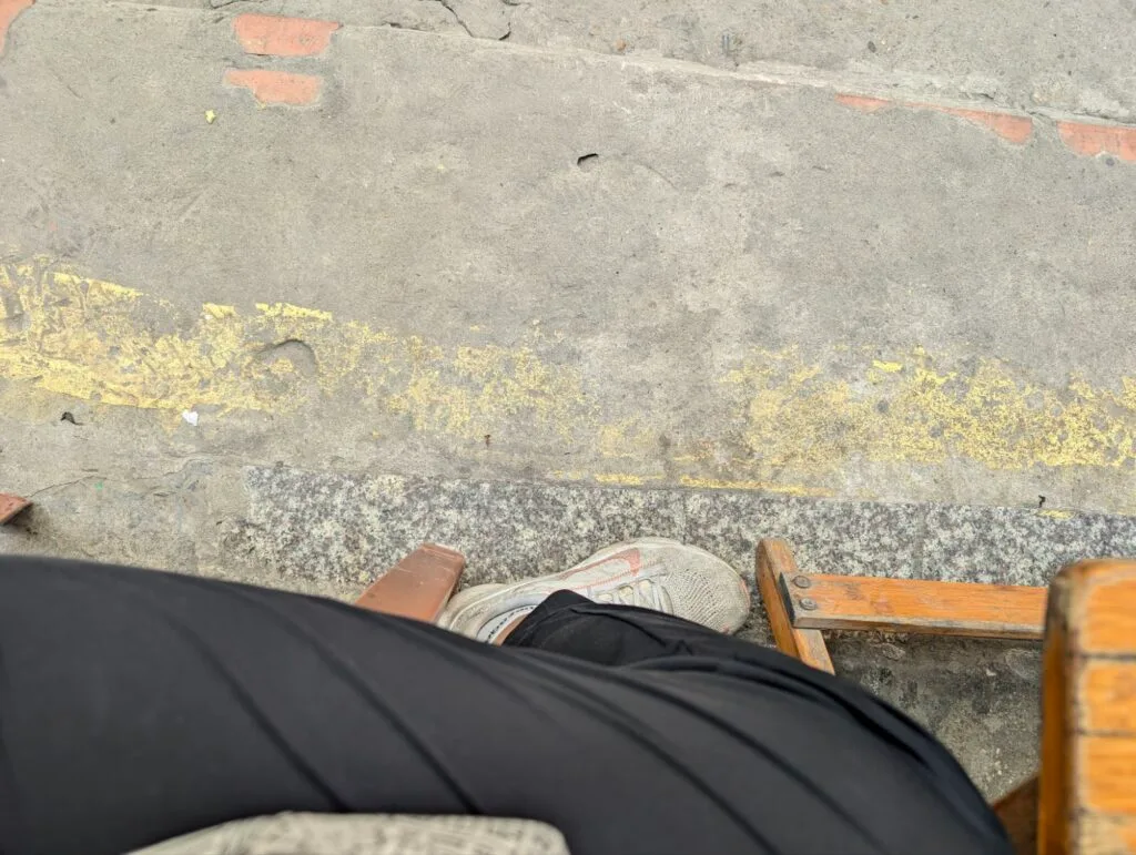 Yellow safety line for train track