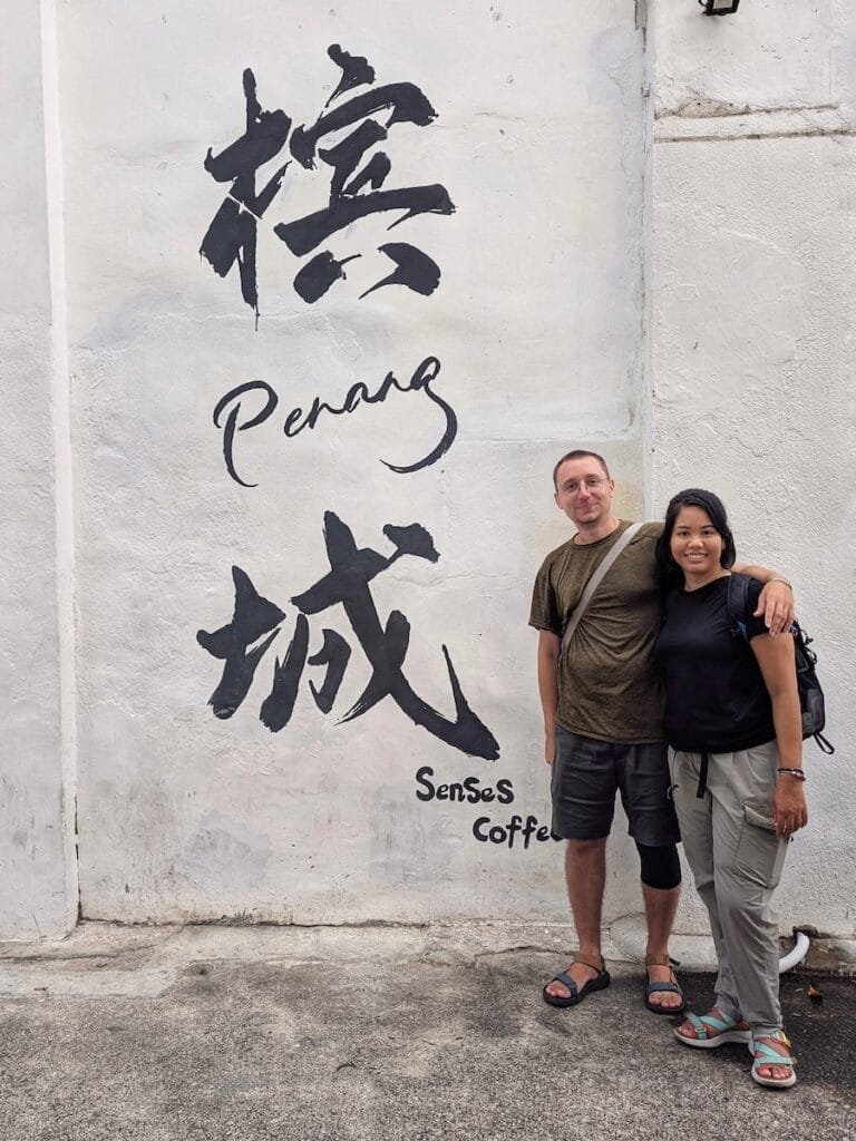 Us with the Wall Art at N419 Senses Coffee Shop